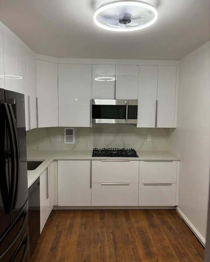 Renovated kitchen with quartz countertops in Germantown